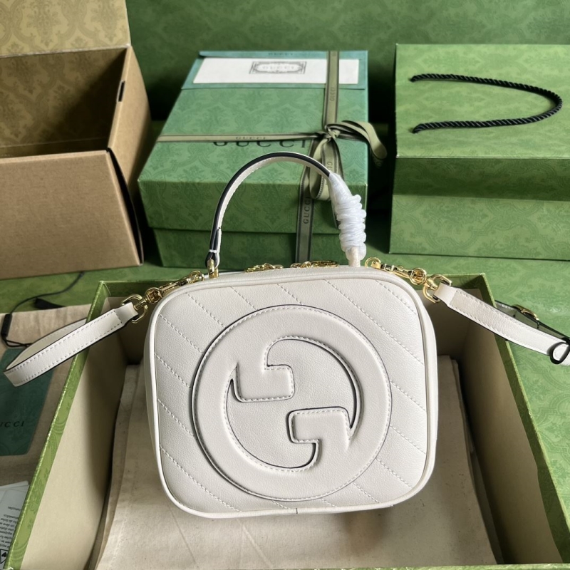 G*u*i top handle bags